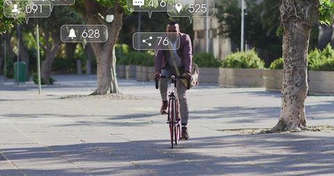 Man in Purple Blazer Cycling in Urban Setting with Social Media Icons