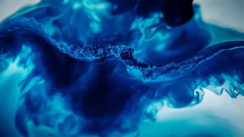 Mesmerizing Swirling Blue Dye in Water Explores Fluid Dynamics