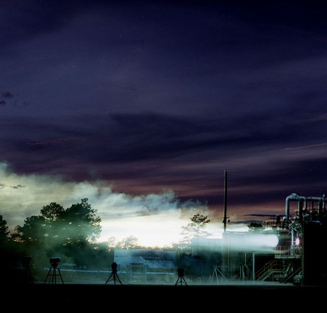 750 K motor test firing at Marshall's Test Stand 116 developing 650 pounds of thrust. The motor was tested for the Air Force Expendable Launch Vehicle (ELV) project.