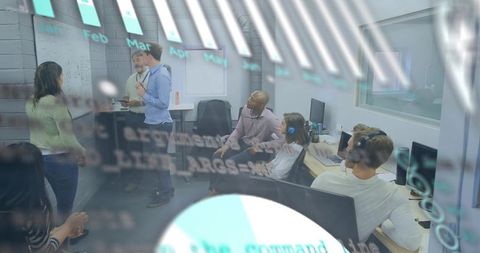 Startup team brainstorming around whiteboard and monitors with headsets in modern office