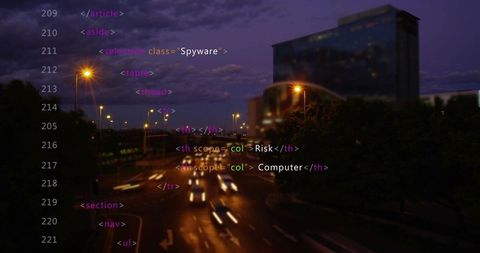 Creating urban vehicle light trails crossing multi-lane roadway at dusk with code overlay