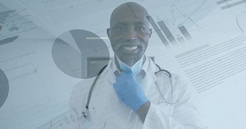 Confident doctor with overlaid data graphics in clinical setting