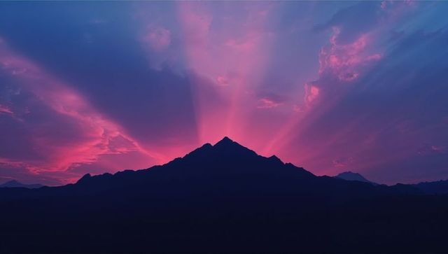 Majestic Mountain Silhouette at Purple Twilight