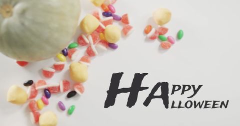 Colorful Halloween Sweets and Pumpkin Arrangement