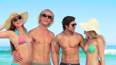 Group of Friends Enjoying Summer at Beach