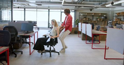 Team Having Fun in Modern Open Workspace Office