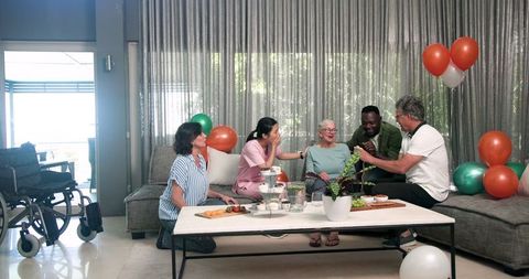 Diverse Group Welcoming New Patient in Treatment Facility