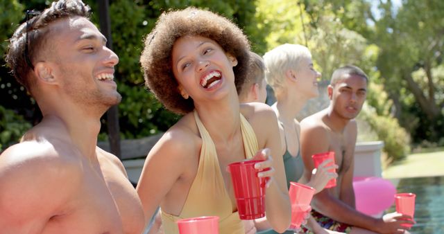 Friends Laughing and Enjoying Drinks by Poolside - Download Free Stock Images Pikwizard.com