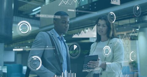 Professionals Analyzing Data with Advanced Digital Interface in Office - Download Free Stock Images Pikwizard.com