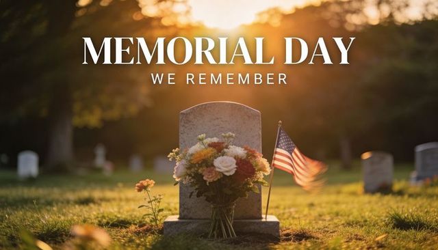 Memorial day cemetery headstone with bouquet and american flag in golden hour light