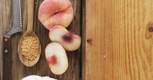 Fresh Sliced Peaches on Rustic Wooden Table with Knife and Mustard Seeds - Download Free Stock Images Pikwizard.com