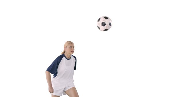 Focused Female Soccer Player Preparing to Hit Ball - Download Free Stock Images Pikwizard.com