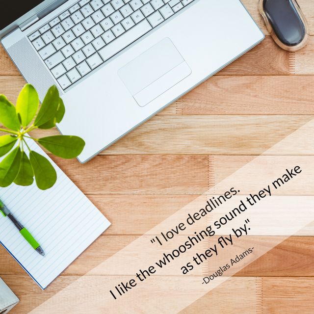 Workspace setup featuring laptop, notebook, pen and mouse accompanied by an inspirational quote by Douglas Adams, perfect for use in articles, blogs, presentations about productivity, motivation and office work.