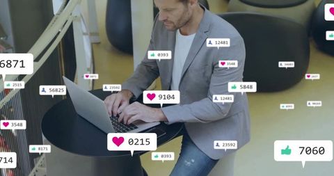 Business Professional Engages with Social Media on Laptop