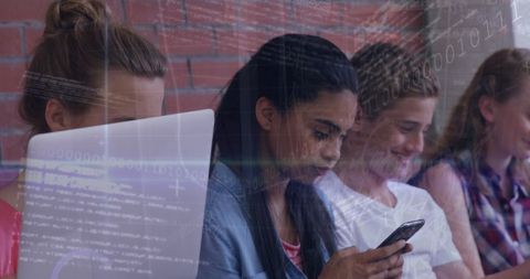 Diverse teens engaged with technology and coding symbolism