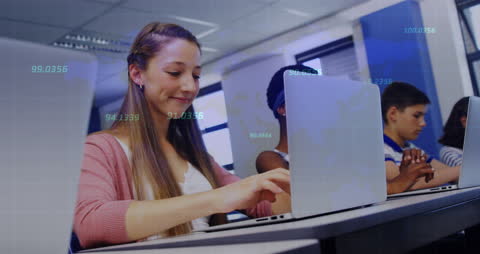 Students Engaging with Laptops and Digital Data Representation