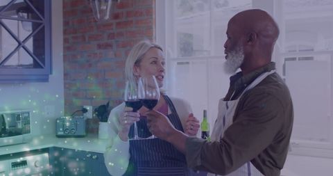 Senior Couple Enjoying Wine in Cozy Kitchen Atmosphere