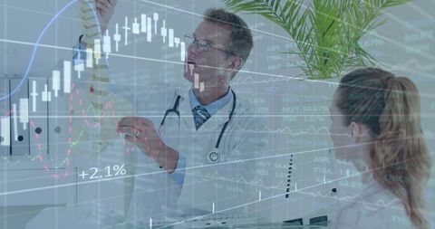 Doctor explaining spine model to patient with financial charts overlay for health analytics insights