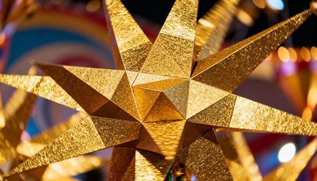 Glittering multi-pointed gold star ornament catching warm market lights for festive decor