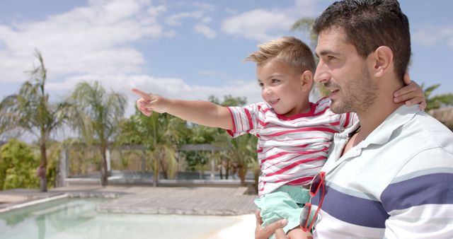 Father and Son Bonding by Swimming Pool on Sunny Day - Download Free Stock Images Pikwizard.com