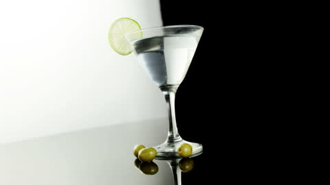 Martini with Olives and Lime Slice, Monochrome Background Contrast