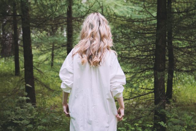 Woman with Blonde Hair Exploring Forest in White Dress - Download Free Stock Photos Pikwizard.com