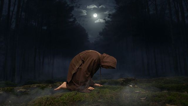 Hooded Monk Kneeling in Moonlit Forest Clearing