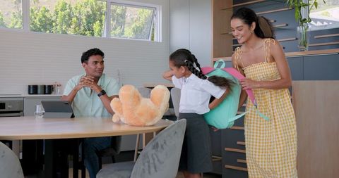 Family Engaging in Quality Time with Technology and Play at Home