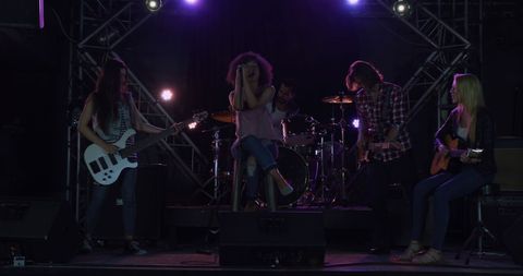Diverse Band Rehearsing Together Under Stage Lights - Download Free Stock Images Pikwizard.com