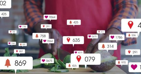 Senior man chopping avocado on counter with social media notification overlays