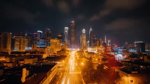 Dynamic Light Trails in Modern City Nightscape