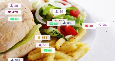 Crunchy roll sandwich, crinkle-cut fries and fresh salad with social engagement badges