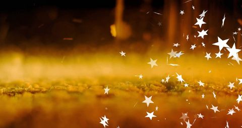 Festive sparkling stars on glowing background