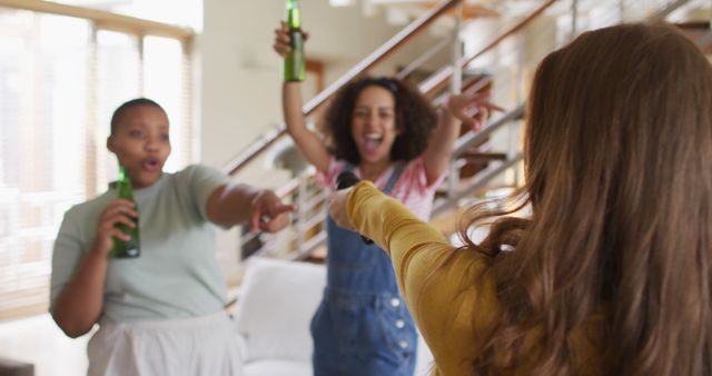 Diverse Friends Singing and Enjoying Drinks at Home - Download Free Stock Images Pikwizard.com