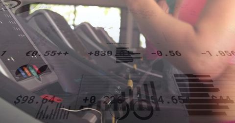 Adjusting cardio console on treadmill with transparent data overlays showing fitness metrics
