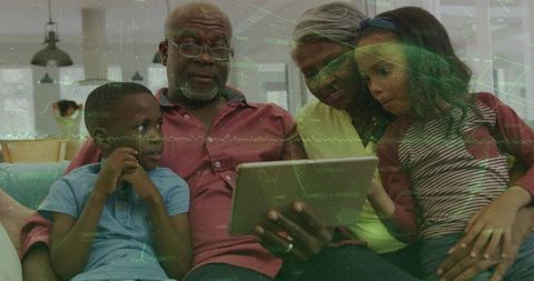 Multigenerational family using tablet with green digital data overlay for learning together