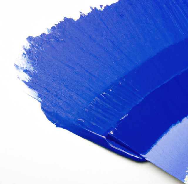 Bright blue paint stroke on white background, ideal for abstract designs and creative projects. Suitable for backgrounds, digital artworks, print materials, and website design elements.