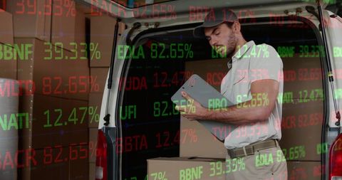 Delivery Driver Using Tablet Near Stock Market Data - Download Free Stock Images Pikwizard.com