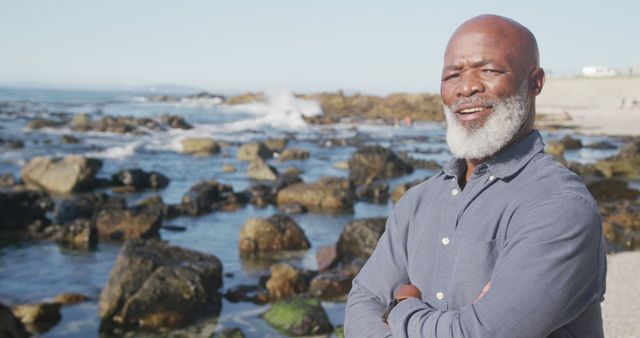 Happy Senior Man Smiling Outdoors by Rocky Beach - Download Free Stock Images Pikwizard.com