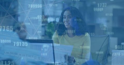 woman engaged in data processing in modern office setting - Download Free Stock Images Pikwizard.com
