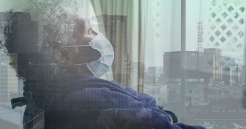 Reflection of disabled african american woman over cityscape