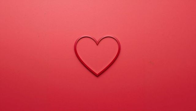 Elegant Minimal Red Heart Outline on Textured Background Featuring Subtle Shadow Romance