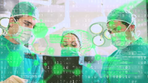 Surgeons Analyzing Digital Data in High-Tech Surgery Room