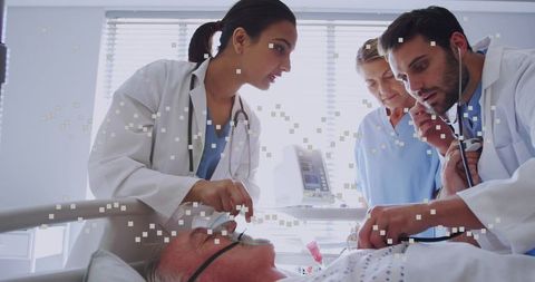 Medical Team Performing Critical Examination on Elderly Patient