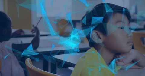 Asian boy studying and viewing ar overlay in classroom for educational technology learning