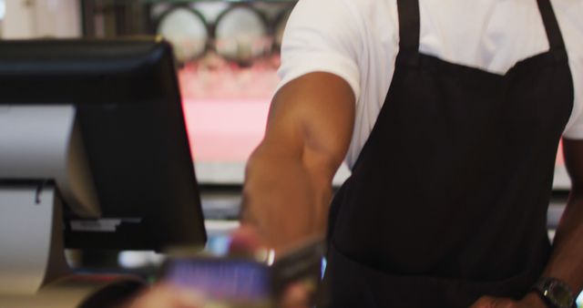 Cashier Processing Contactless Payment with Customer - Download Free Stock Images Pikwizard.com