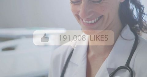 Smiling female doctor wearing lab coat and stethoscope with social media likes overlay