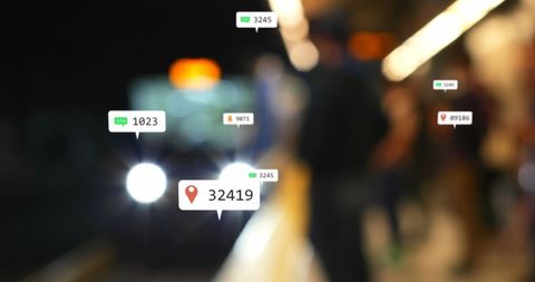 Social media engagement over blurred cityscape