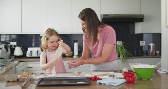 Mother and Daughter Rolling Dough Together in Kitchen During Lockdown - Download Free Stock Images Pikwizard.com