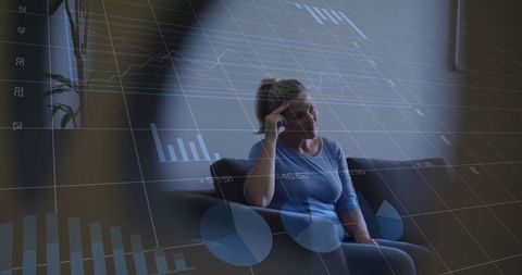 Businesswoman reflecting on market data and financial strategy